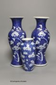 A pair of late 19th century Chinese prunus blossom baluster vases, 30cm, and a Japanese ovoid vase
