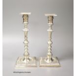 A matched pair of late Victorian/Edwardian silver candlesticks, Thomas Bradbury & Sons, London,