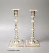 A matched pair of late Victorian/Edwardian silver candlesticks, Thomas Bradbury & Sons, London,