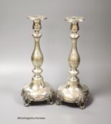 A pair of 19th century Polish? white metal candlesticks, 33.1cm, weighted,stamped '12', with