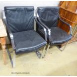 Knoll International style. A pair of Mies Van de Rohe design black leather and chrome cantilever