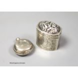 A 19th century Dutch white metal pill box, 42mm and a base metal sovereign case.