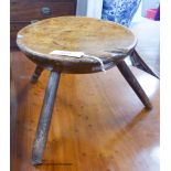 A 19th century primitive fruitwood stool. D-30, H-25cm.