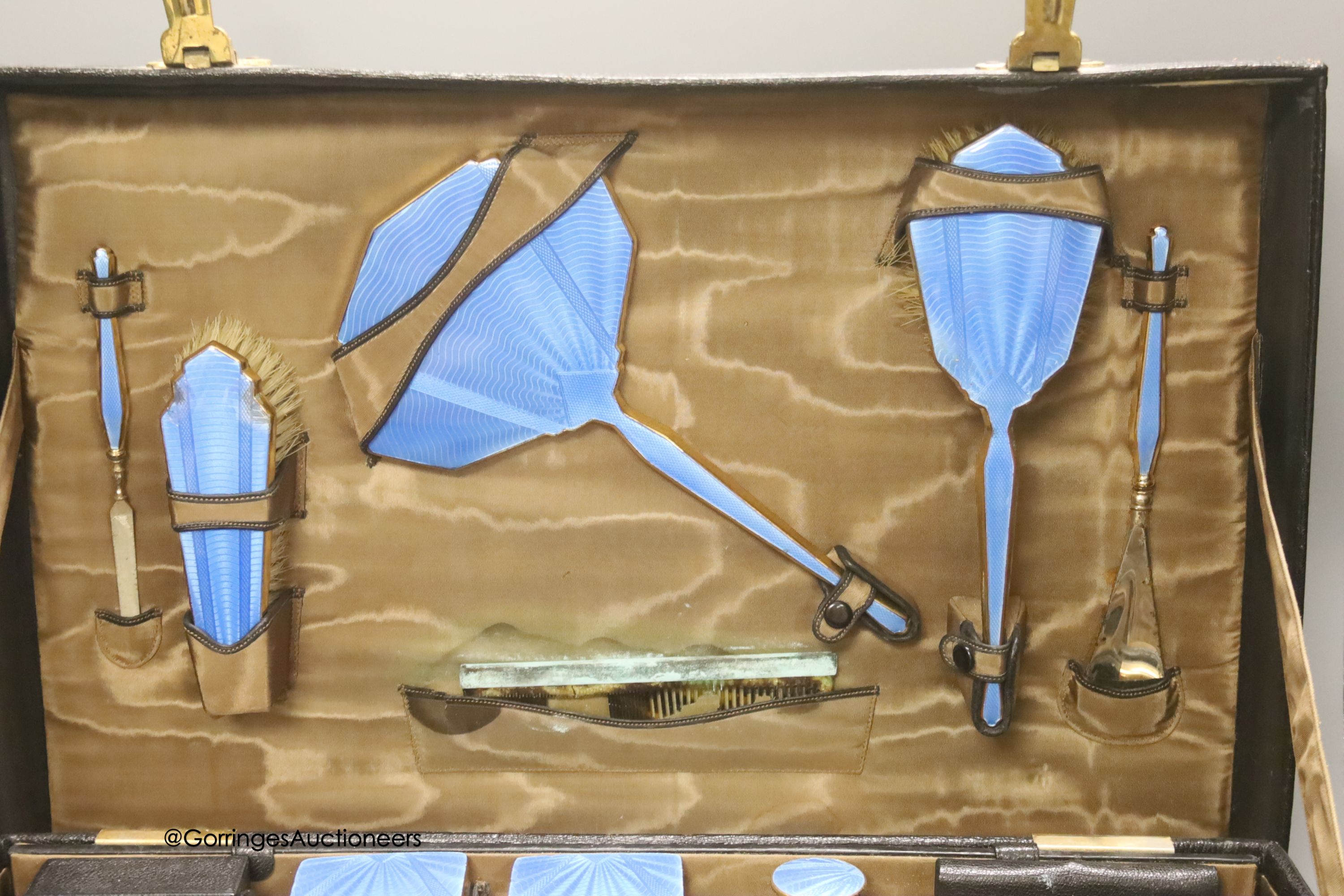 An early 20th century leather vanity case, with enclosed accessories and five further silver - Image 2 of 4