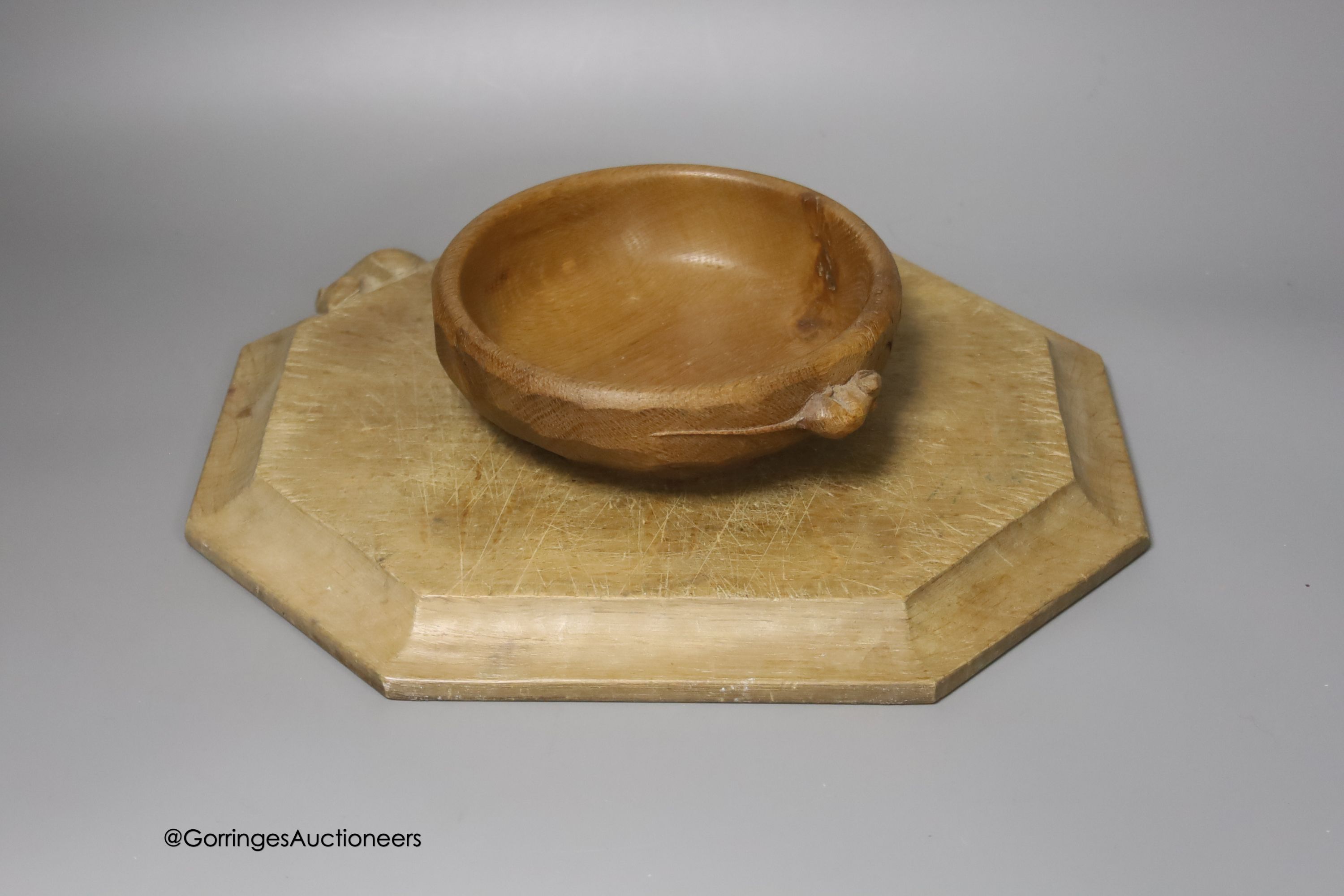 A Mouseman octagonal cheese board, 30cm, and a small Mouseman bowl, 15cm