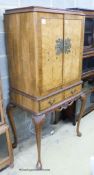 A Queen Anne style brass mounted walnut veneered bar cabinet on stand, width 84cm, depth 53cm,