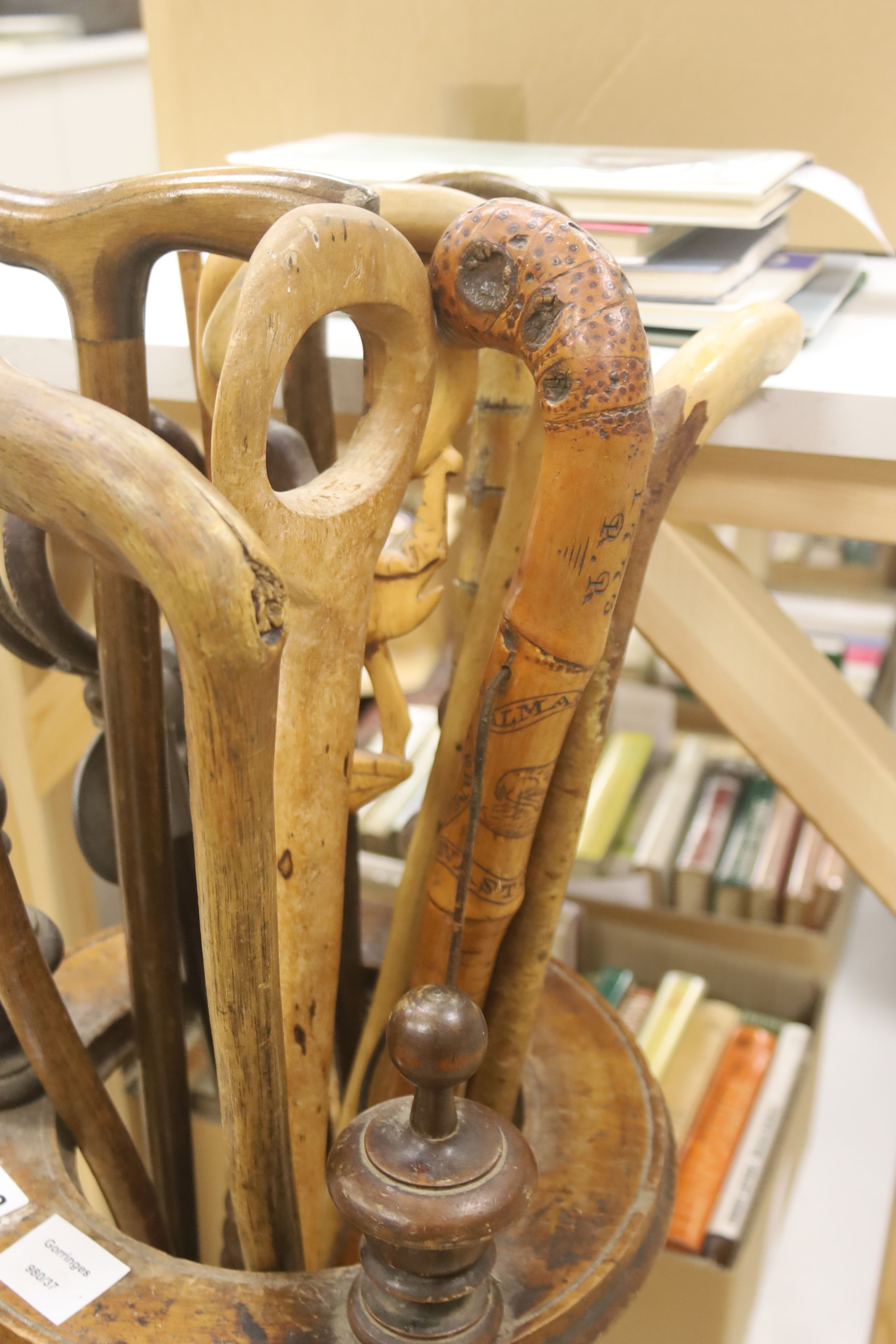 A circular turned beech stick stand, containing various walking sticks and a shooting stick - Image 2 of 5