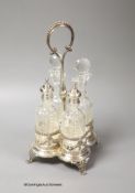 A 20th century Portuguese silver cruet stand, with four bottles, two with silver mounts, Oporto