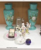 A pair of Sitzendorf porcelain figures, a pair of green vases and a clairvoyance crystal with