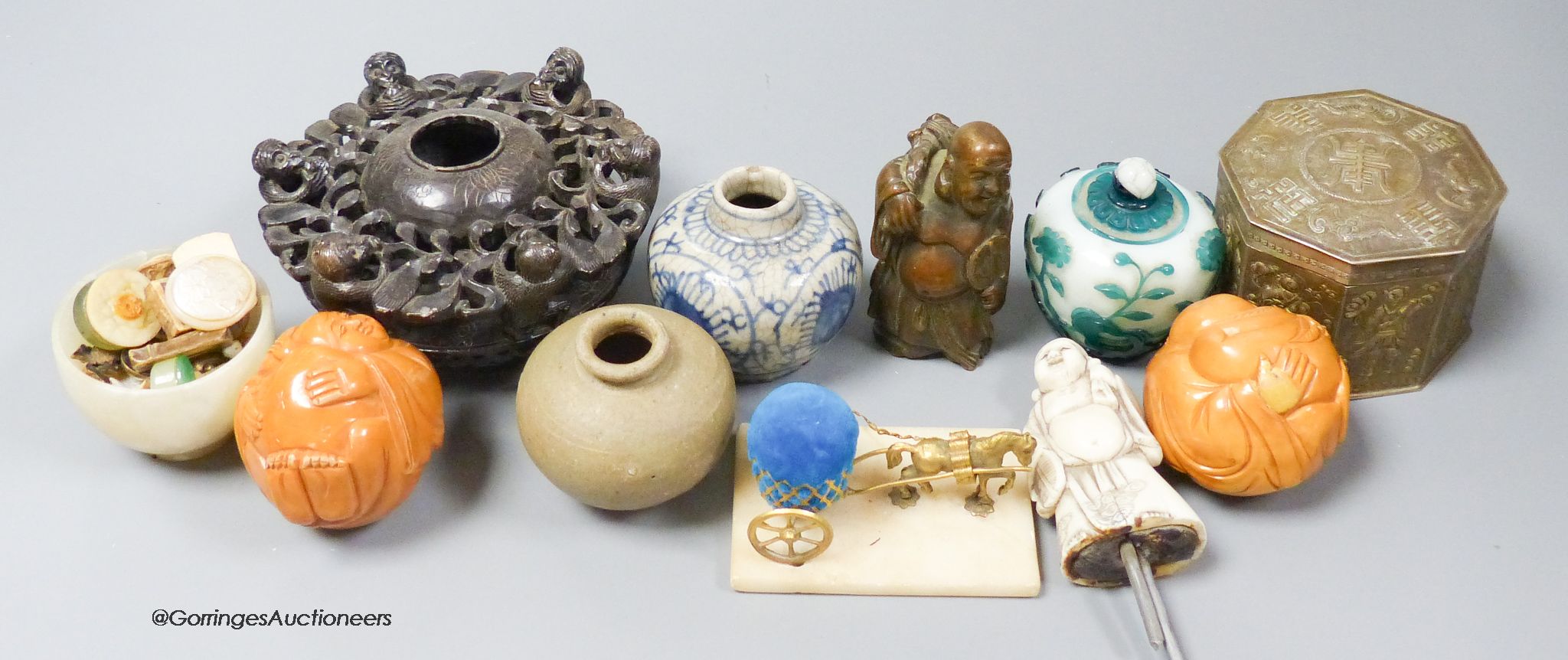 A collection of Chinese decorative pieces including glass, ceramic, metal and mineral
