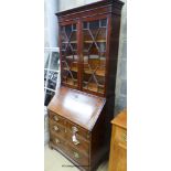 A small George III and later mahogany bureau bookcase, width 76cm depth 50cm height 192cm