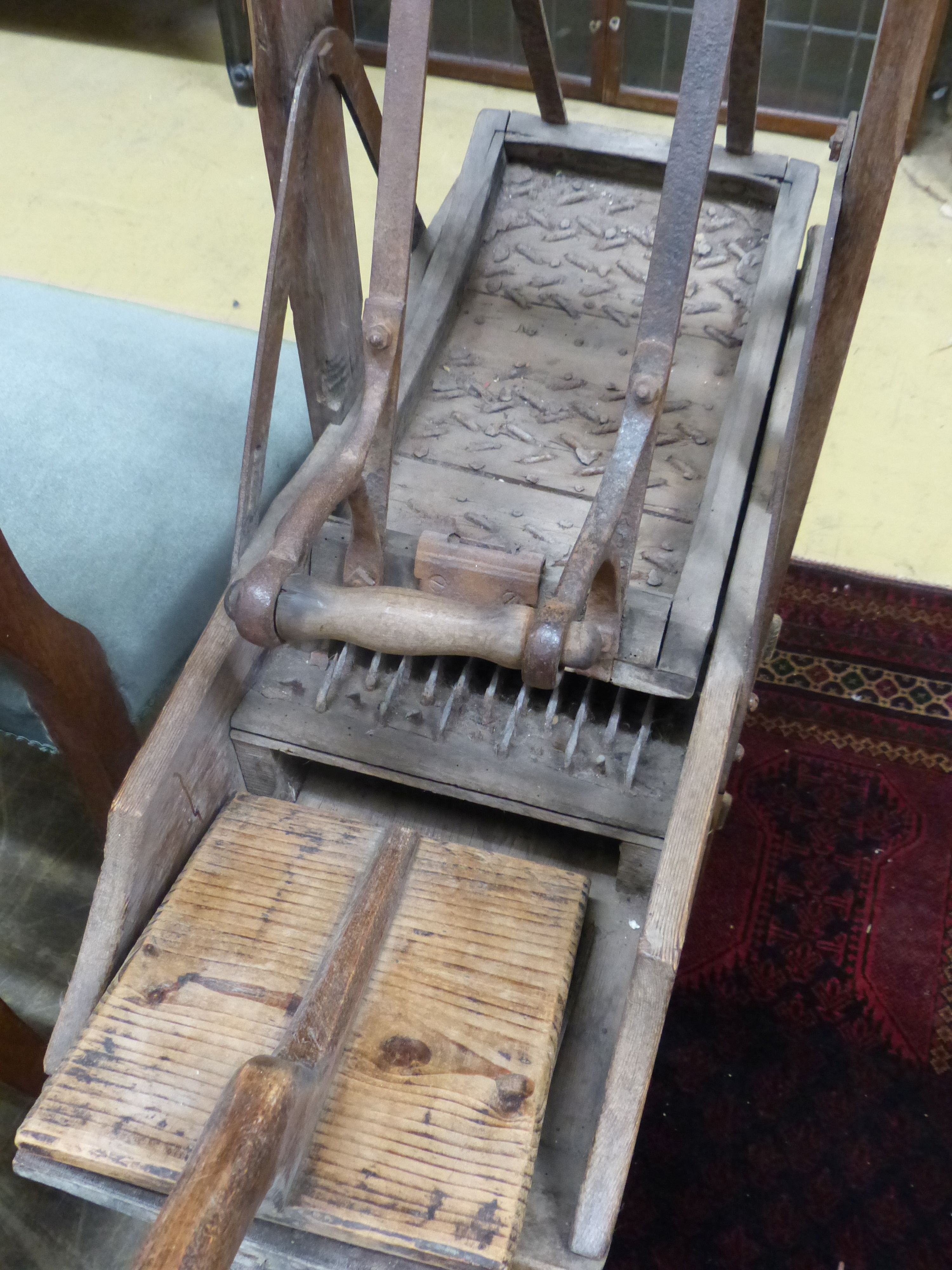 A late 19th century French Provincial (Lille) pine and wrought iron carding machine and two carding - Image 2 of 4