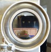 A contemporary circular wall mirror by Andrew Martin, D-76cm.