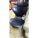 A set of four Arne Jacobsen chairs