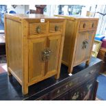 A pair of Korean hardwood bedside cupboards, width 40cm, depth 35cm, height 61cm