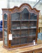 An early 19th century Dutch floral marquetry inlaid walnut and mahogany hanging display cabinet,