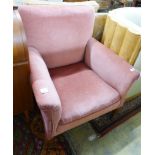 An Edwardian pink upholstered armchair