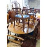 A set of six Hepplewhite style mahogany dining chairs (two with arms) and a George III style