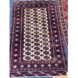 A Bokhara ivory ground rug, 190 x 120cm