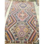 A Turkish kelim polychrome flatweave carpet, 278 x 155cm