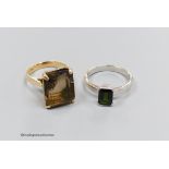 An 18ct white gold and tourmaline ring, size Q, gross 5g, and a 14k gold and smoky quartz ring,