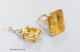 A large yellow metal mounted citrine ring, size M, gross 19.4g. and a similar pendant
