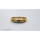 An 18ct gold sapphire and diamond 5-stone ring, size R, gross 2g.