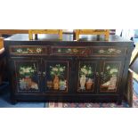 A Chinese black and polychrome painted dresser, fitted three drawers over cupboards, length 156cm,