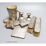 A pair of dwarf pillar candlesticks, a silver-mounted mug, a Georgian snuff box (a.f.), two vesta