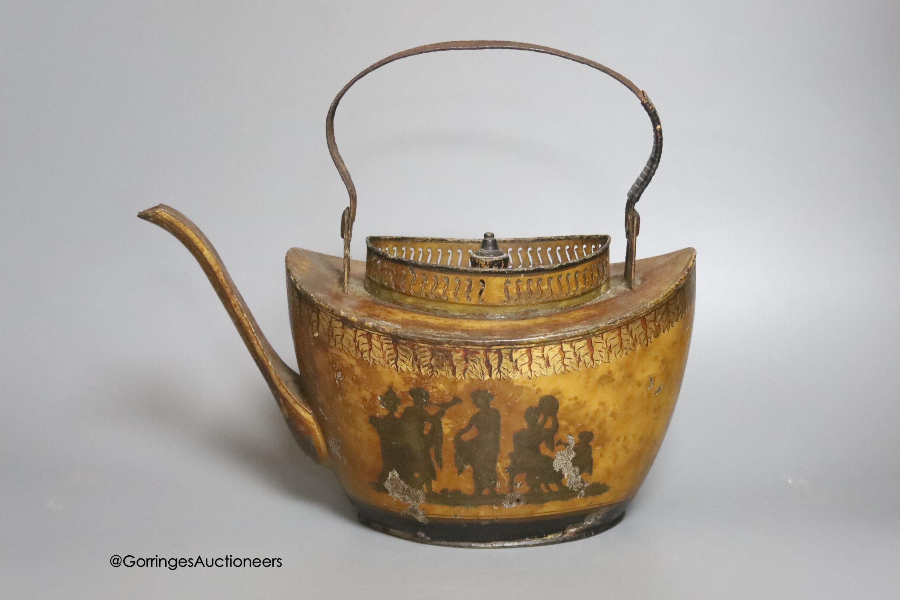 A 19th century Pontypool toleware tea kettle, length 31cm