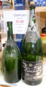 Two large wine / champagne empty bottles, tallest 60cm