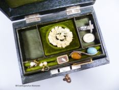 A small green leather jewellery box of assorted minor jewellery;Carved ivory Pliny Doves brooch,