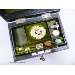A small green leather jewellery box of assorted minor jewellery;Carved ivory Pliny Doves brooch,