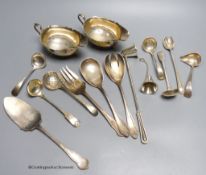 A pair of oval silver sauce boats, a pair of Scottish George III silver sauce ladles, another pair