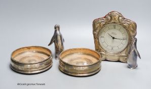 A small R. Carr silver mounted mantel clock, modern, a pair of silver coasters, JB Ld, London 1996,