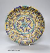 A Moroccan pottery dish, diameter 26cm