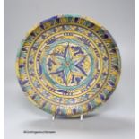 A Moroccan pottery dish, diameter 26cm