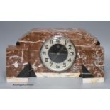 An Art Deco rouge marble clock garniture, length 36cm