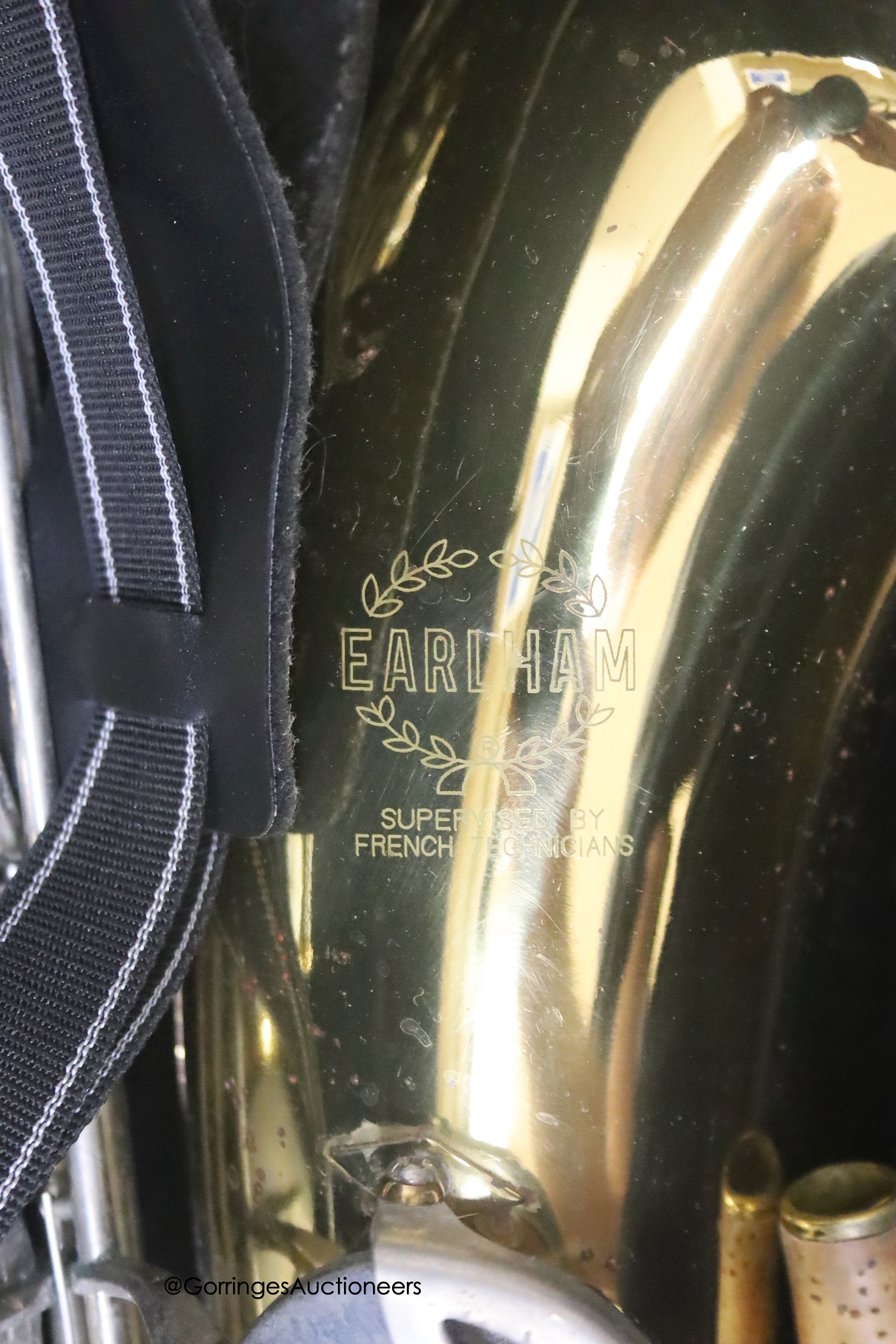 A cased Earlham brass saxophone and music sheets - Image 3 of 7