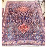 A Caucasian blue ground rug, 188 x 154cm