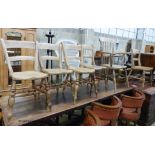 A Victorian elm and beech Windsor elbow chair togehter with five Victorian Windsor kitchen chairs