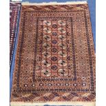 A Bokhara red ground rug, 150 x 116cm