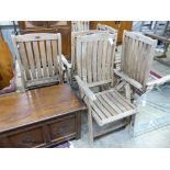 Five weathered teak folding reclining garden armchairs