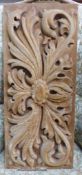 A rectangular carved oak panel, 30 x 72cm