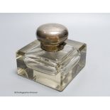 A George V large silver topped glass inkwell, makers mark C and co-, London 1912, 12.5 cm wide