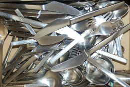 A suite of Georg Jensen stainless steel cutlery and condiments