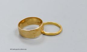 An 18ct. gold wedding band, size P, 5.9g, and a 22ct gold band, size L, 2.9g.