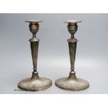 A pair of Edwardian silver candlesticks, by Elkington and co, , Birmingham 1904, loaded, 28.5 cm