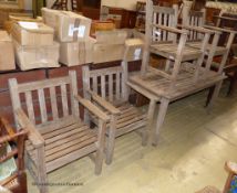 A rectangular weathered teak garden table, length 150cm, depth 71cm, height 68cm together with four