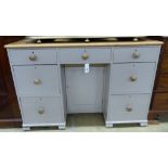 A painted pine kneehole dressing table, length 118cm, depth 50cm, height 79cm